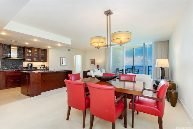 223 Saratoga Rd Unit 3703, Honolulu, HI 96815 - dining space featuring recessed lighting, wet bar, expansive windows, and light colored carpet
