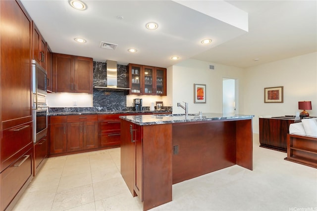 223 Saratoga Rd Unit 3703, Honolulu, HI 96815 - kitchen featuring oven, a sink, glass insert cabinets, reddish brown cabinets, and wall chimney range hood