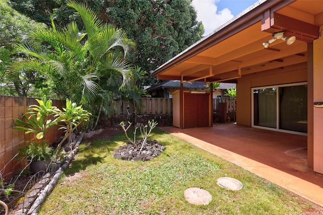 view of yard featuring a fenced backyard and a patio