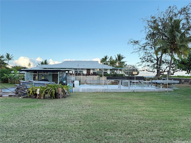 exterior space with a yard
