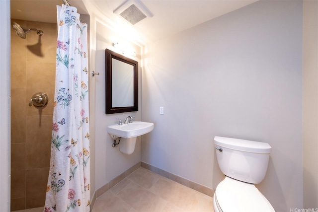 1837 Kalakaua Ave Unit 3304, Honolulu, HI 96815 - full bath with a tile shower, toilet, tile patterned floors, and baseboards