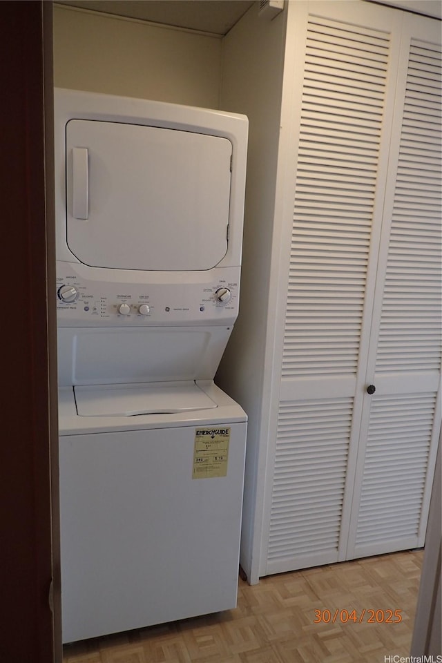 1670 Kalakaua Ave Unit 401, Honolulu, HI 96826 - washroom with laundry area and stacked washer / dryer