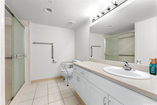 bathroom with toilet, a stall shower, baseboards, tile patterned flooring, and vanity