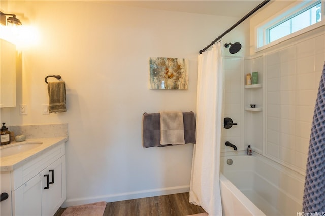 45-842 Anoi Rd Unit E, Kaneohe, HI 96744 - bathroom with vanity, baseboards, shower / bath combo with shower curtain, and wood finished floors