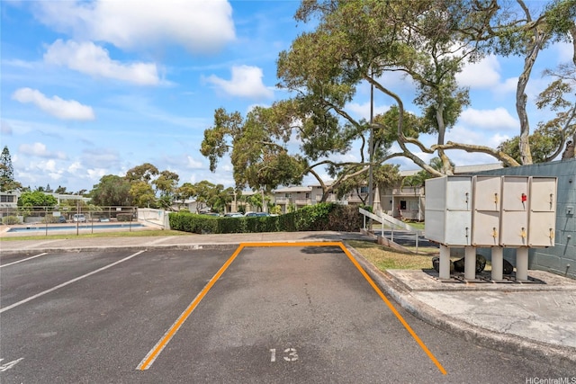 98-685 Kaonohi St Unit E, Aiea, HI 96701 - uncovered parking lot featuring mail area