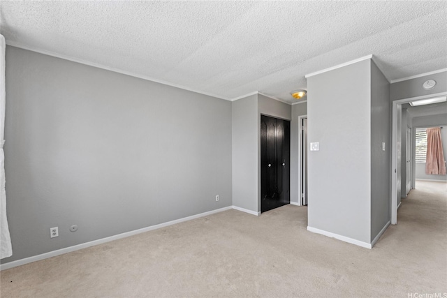 98-685 Kaonohi St Unit E, Aiea, HI 96701 - unfurnished room with light carpet, a textured ceiling, crown molding, baseboards, and a smoke detector
