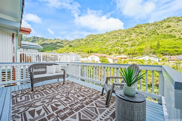 balcony featuring a view of trees