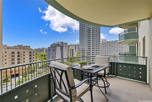 balcony featuring a view of city