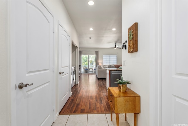 87-176 Maipalaoa Rd Unit D12, Waianae, HI 96792 - hall featuring recessed lighting, tile patterned floors, and washer / dryer