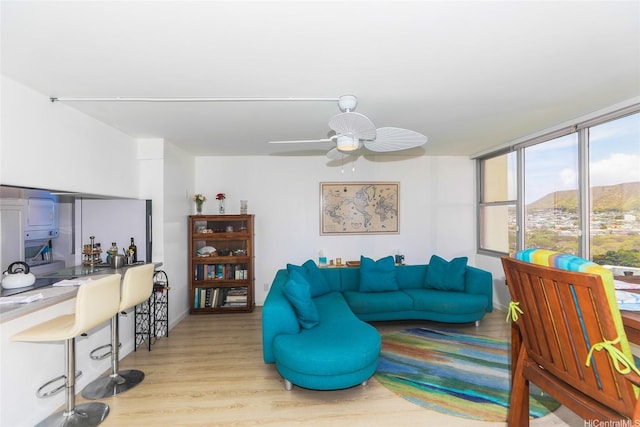 2600 Pualani Way Unit 1201, Honolulu, HI 96815 - living area featuring wood finished floors and ceiling fan