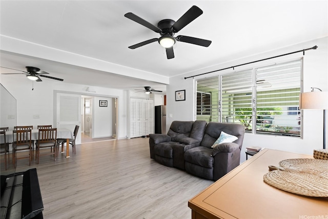 45-533 Pahia Rd, Kaneohe, HI 96744 - living room with a ceiling fan and light wood finished floors