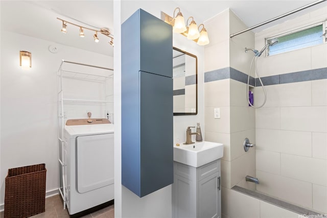 45-533 Pahia Rd, Kaneohe, HI 96744 - full bathroom with vanity, tile patterned floors, washer / clothes dryer, and bathtub / shower combination