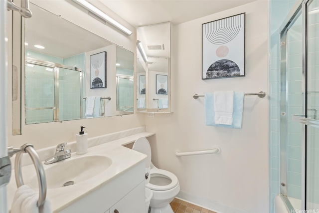 1615 Wilder Ave Unit 604, Honolulu, HI 96822 - full bath featuring a shower with door, toilet, baseboards, vanity, and tile patterned flooring