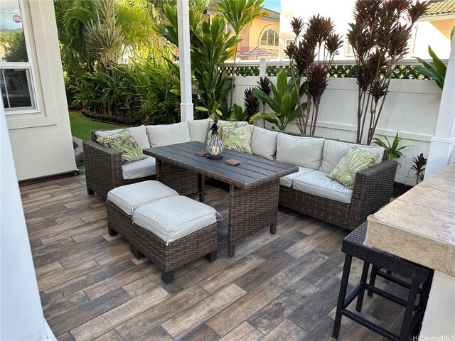 91-1005 Maulihiwa St, Kapolei, HI 96707 - deck with outdoor lounge area, fence, and outdoor dining space