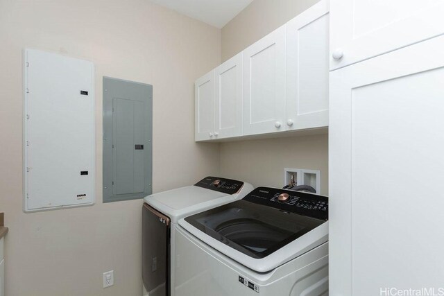 91-1068 Kaikohola St, Ewa Beach, HI 96706 - laundry area featuring electric panel, washer and clothes dryer, and cabinet space