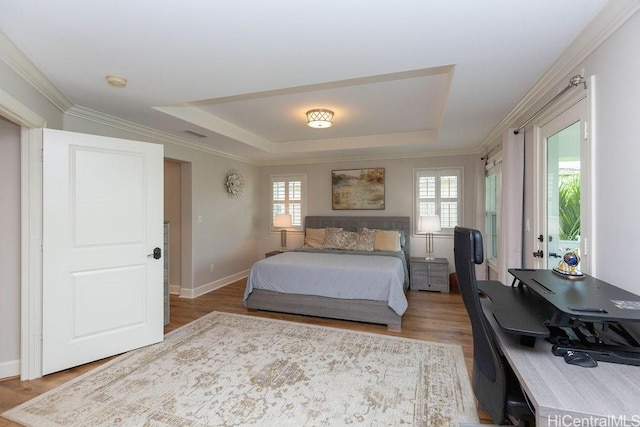 91-1068 Kaikohola St, Ewa Beach, HI 96706 - bedroom featuring baseboards, wood finished floors, and a tray ceiling