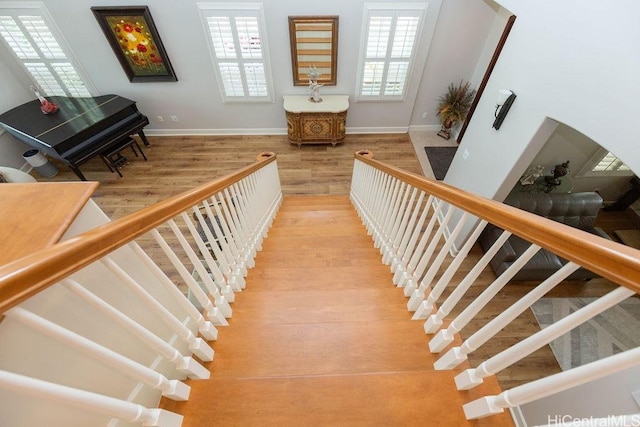 91-1068 Kaikohola St, Ewa Beach, HI 96706 - stairway featuring baseboards and wood finished floors