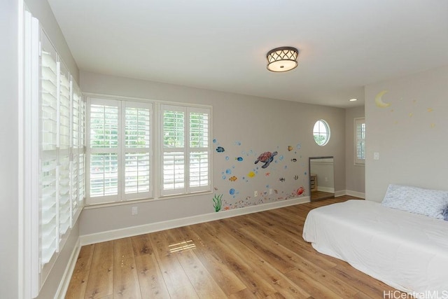 91-1068 Kaikohola St, Ewa Beach, HI 96706 - bedroom featuring light wood finished floors and baseboards
