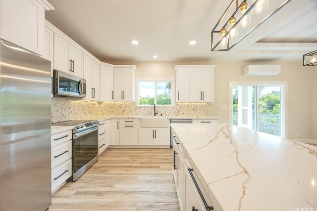 15-1692 7th Ave, Keaau, HI 96749 - kitchen with appliances with stainless steel finishes, a sink, white cabinetry, decorative backsplash, and recessed lighting