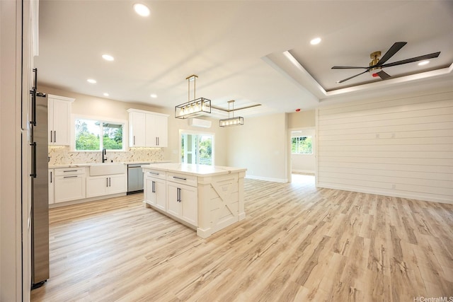 15-1692 7th Ave, Keaau, HI 96749 - kitchen with stainless steel dishwasher, a center island, light wood finished floors, ceiling fan, and recessed lighting