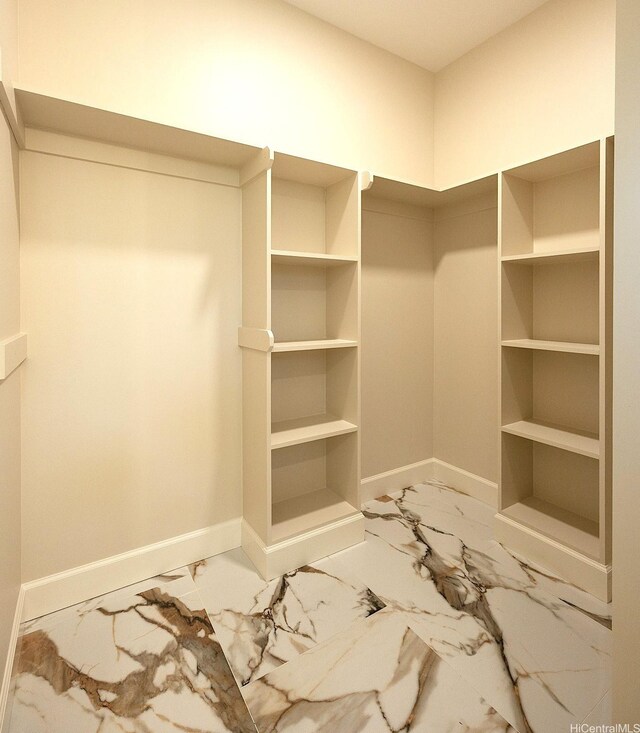 15-1692 7th Ave, Keaau, HI 96749 - walk in closet featuring light marble finish flooring