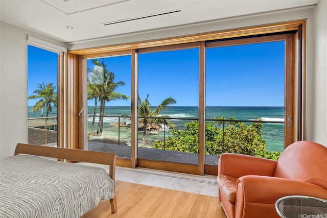 61-279 Kamehameha Hwy, Haleiwa, HI 96712 - bedroom featuring view of water and beach and multiple windows