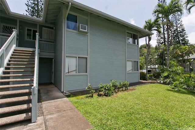 95-802 Wikao St Unit R106, Mililani, HI 96789 - view of home's exterior with a yard and stairway