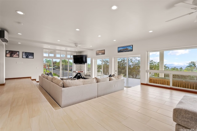 75 Poipu Dr, Honolulu, HI 96825 - living room featuring a ceiling fan and recessed lighting