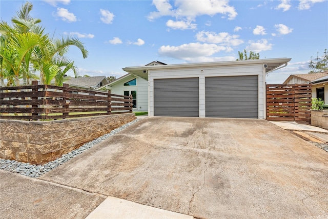 garage with fence