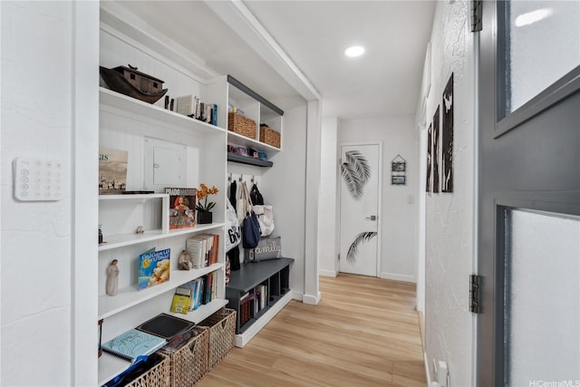 mudroom with baseboards, wood finished floors, and recessed lighting