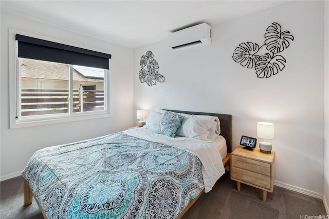 bedroom featuring a wall mounted air conditioner, carpet flooring, and baseboards