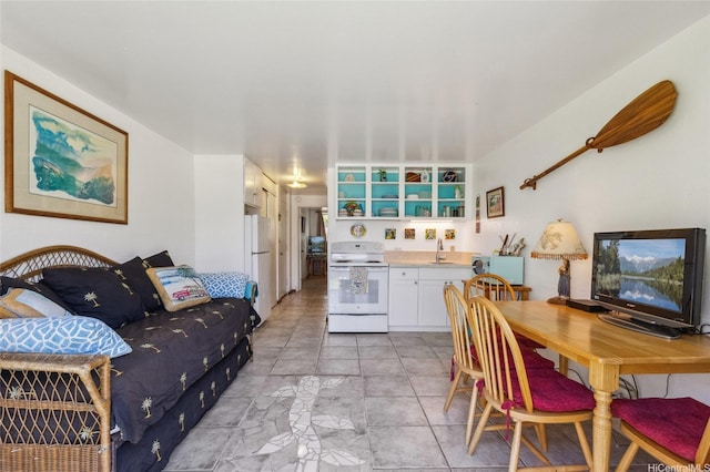 living room featuring light tile patterned flooring