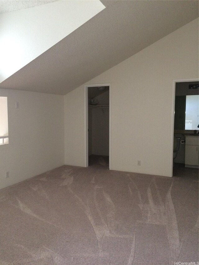 432 Mananai Pl Unit 18C, Honolulu, HI 96818 - additional living space with vaulted ceiling and carpet