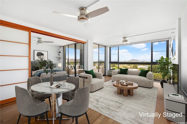 322 Aoloa St Unit 907, Kailua, HI 96734 - sunroom featuring expansive windows and wood finished floors