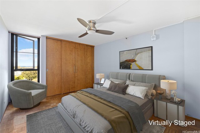 322 Aoloa St Unit 907, Kailua, HI 96734 - bedroom featuring a closet and ceiling fan
