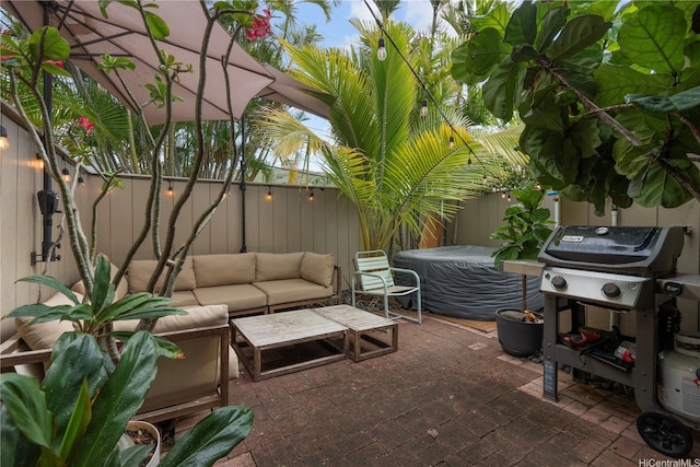 6129 Summer St Unit 6129D, Honolulu, HI 96821 - view of patio / terrace featuring a fenced backyard, an outdoor living space, and area for grilling