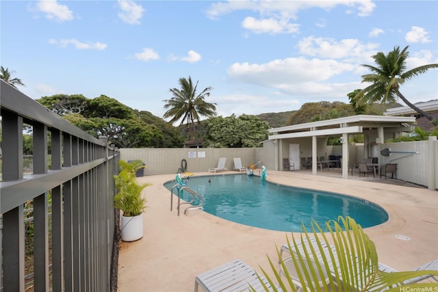 6129 Summer St Unit 6129D, Honolulu, HI 96821 - view of swimming pool with a patio area and fence
