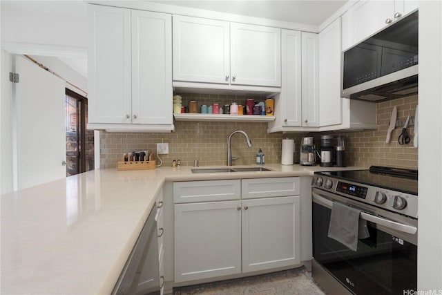 6129 Summer St Unit 6129D, Honolulu, HI 96821 - kitchen with appliances with stainless steel finishes, a sink, tasteful backsplash, and light countertops