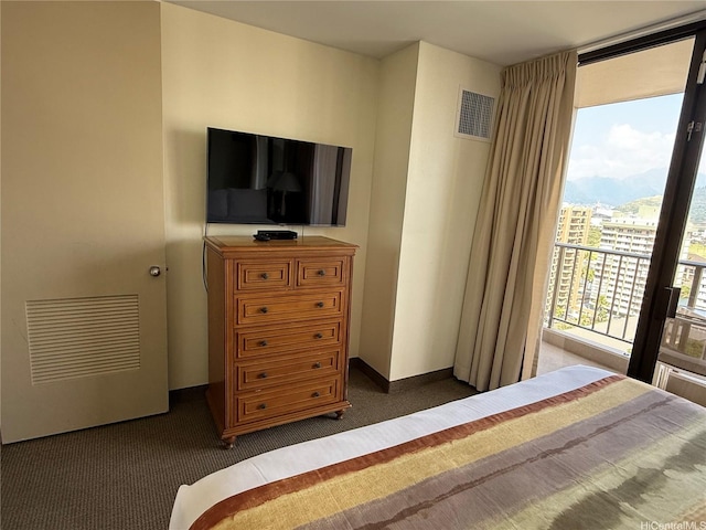 229 Paoakalani Ave Unit 1803, Honolulu, HI 96815 - carpeted bedroom with baseboards and visible vents