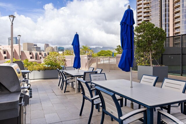 425 S St Unit 2004, Honolulu, HI 96813 - view of patio / terrace with outdoor dining area and area for grilling