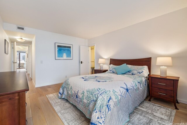 425 S St Unit 2004, Honolulu, HI 96813 - bedroom with light wood-type flooring and baseboards