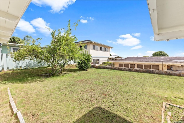 view of yard with fence
