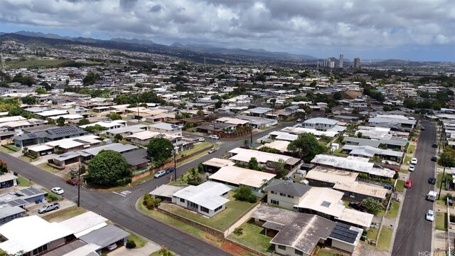 birds eye view of property featuring a mountain view