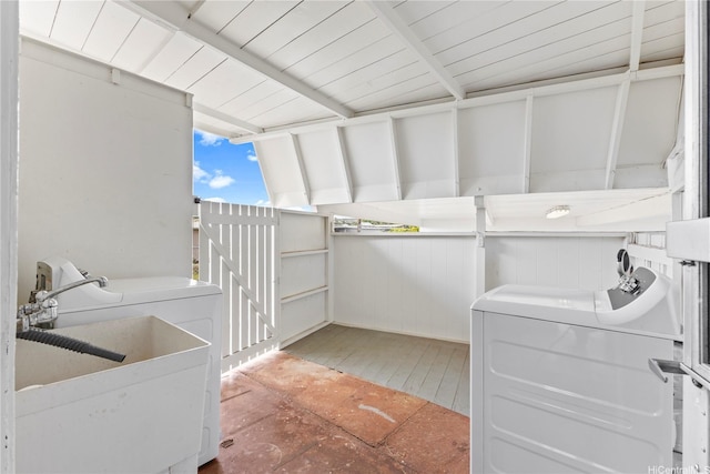 laundry room with washer / dryer and a sink