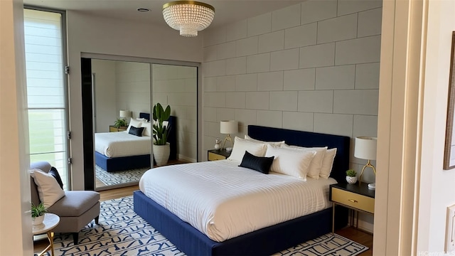 bedroom featuring wood finished floors