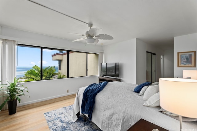 46-058 Aliikane Pl Unit 2123, Kaneohe, HI 96744 - bedroom with wood finished floors, ceiling fan, and baseboards