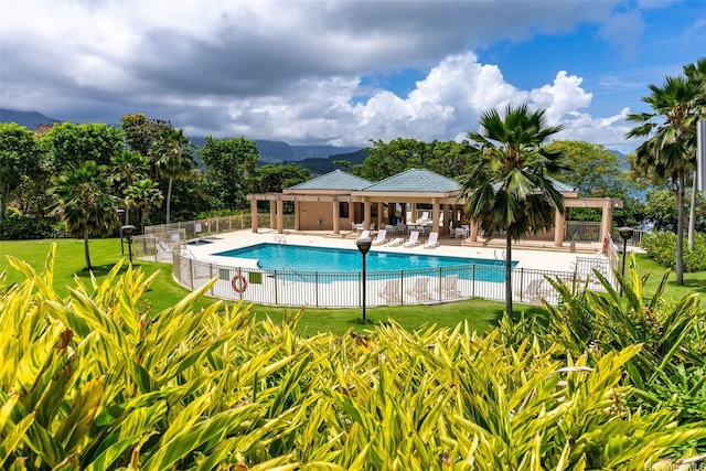 46-058 Aliikane Pl Unit 2123, Kaneohe, HI 96744 - community pool featuring a patio area and a mountain view