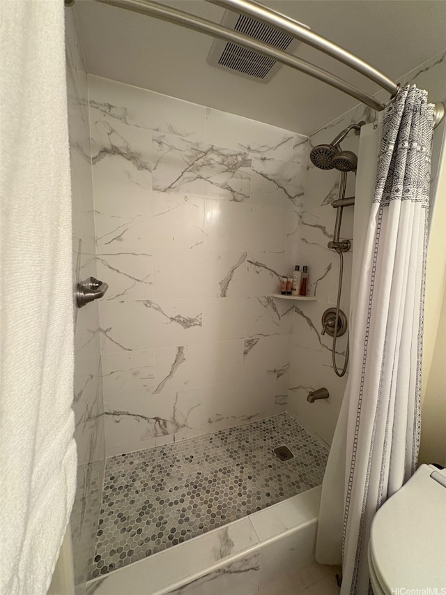 2140 Kuhio Ave Unit 911, Honolulu, HI 96815 - bathroom with toilet and a shower stall