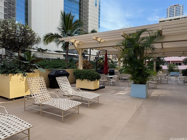 2140 Kuhio Ave Unit 911, Honolulu, HI 96815 - view of patio with a pergola and grilling area