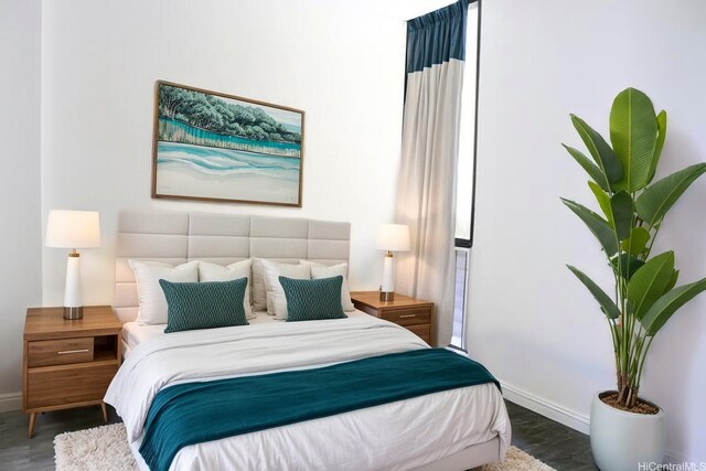 320 Liliuokalani Ave Unit 902, Honolulu, HI 96815 - bedroom featuring wood finished floors